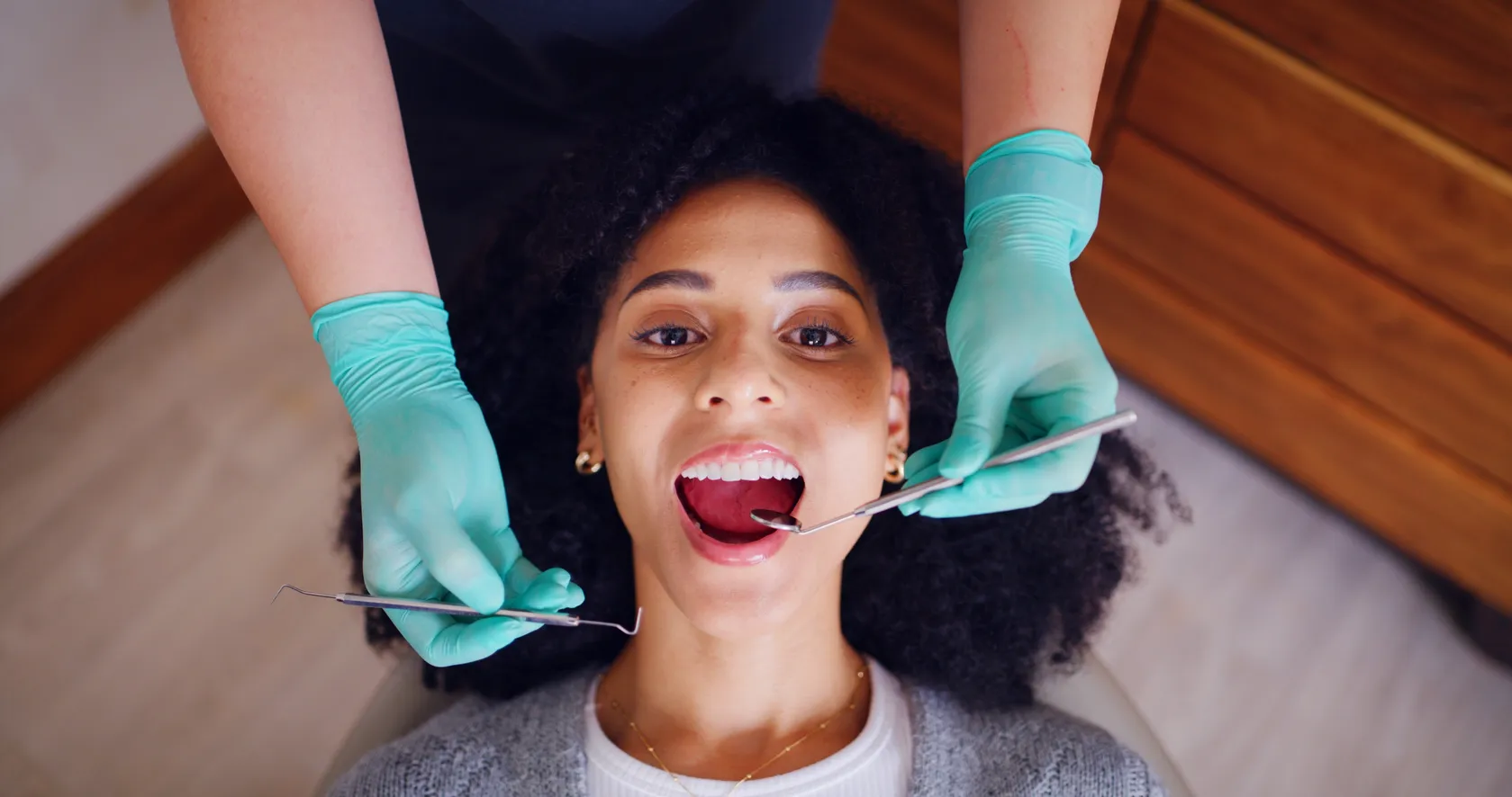 Dentist reviewing digital X-rays with a patient at Dental Studio of Marin